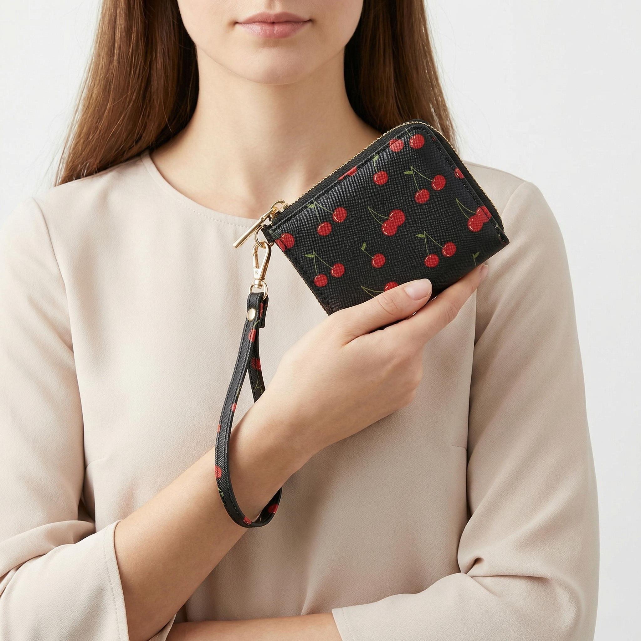 Billetera wristlet con llamativo estampado de cerezas rojas